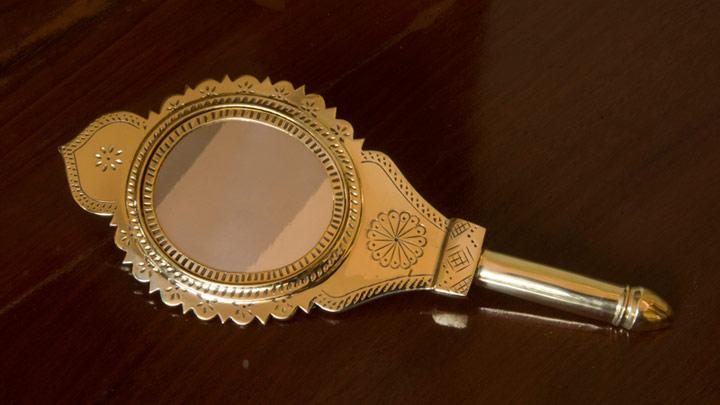 How does one convert a piece of metal alloy into a unique mirror? 